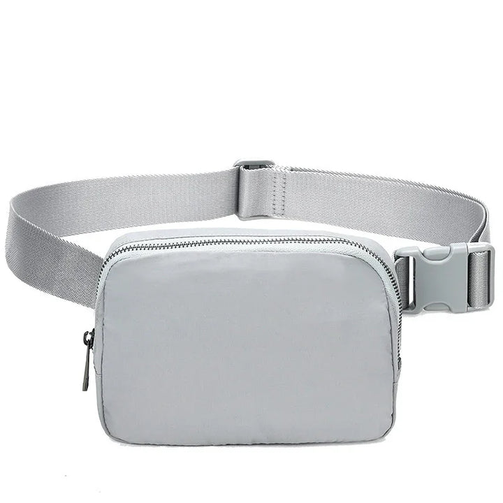 Minimalist light gray waist bag with adjustable strap and zipper closure