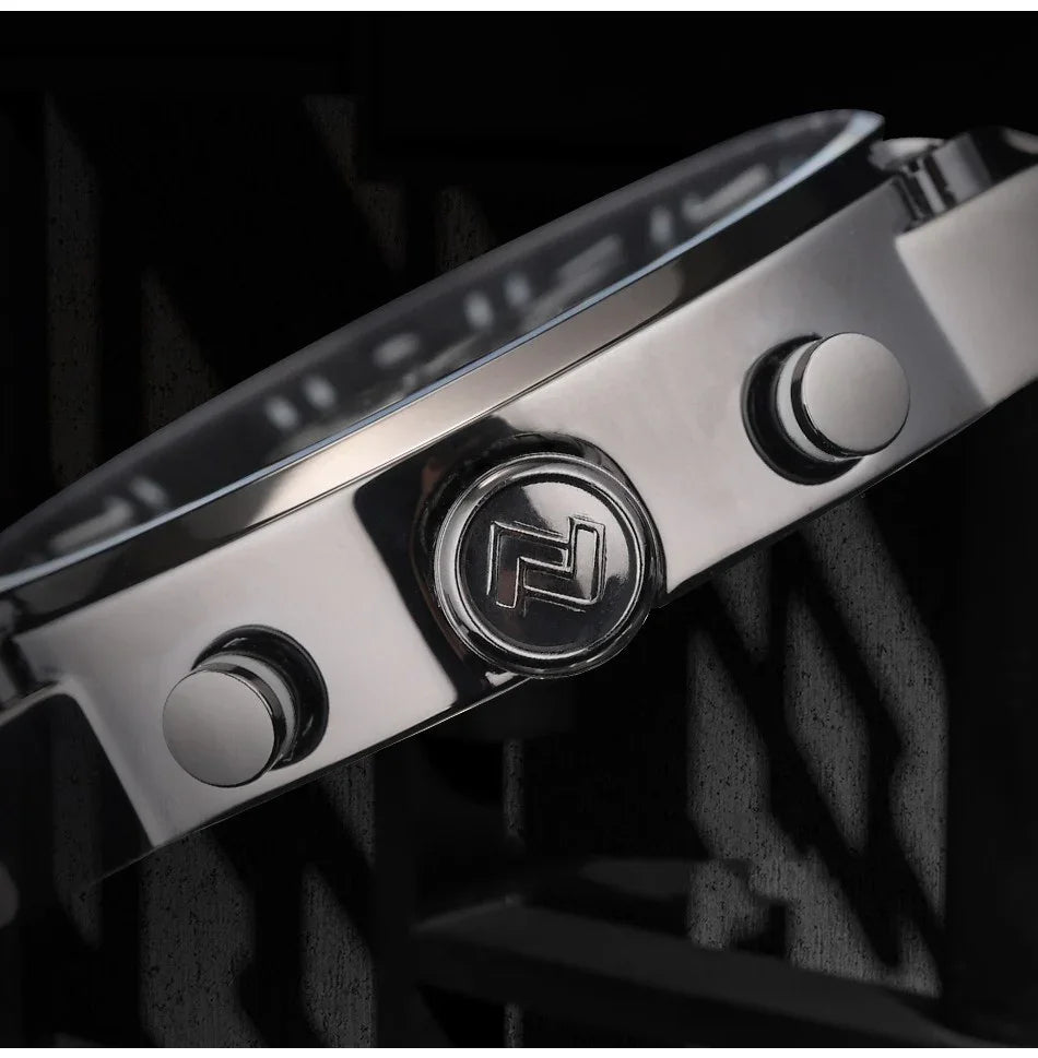 Close-up of silver watch crown and push buttons with engraved logo on black background