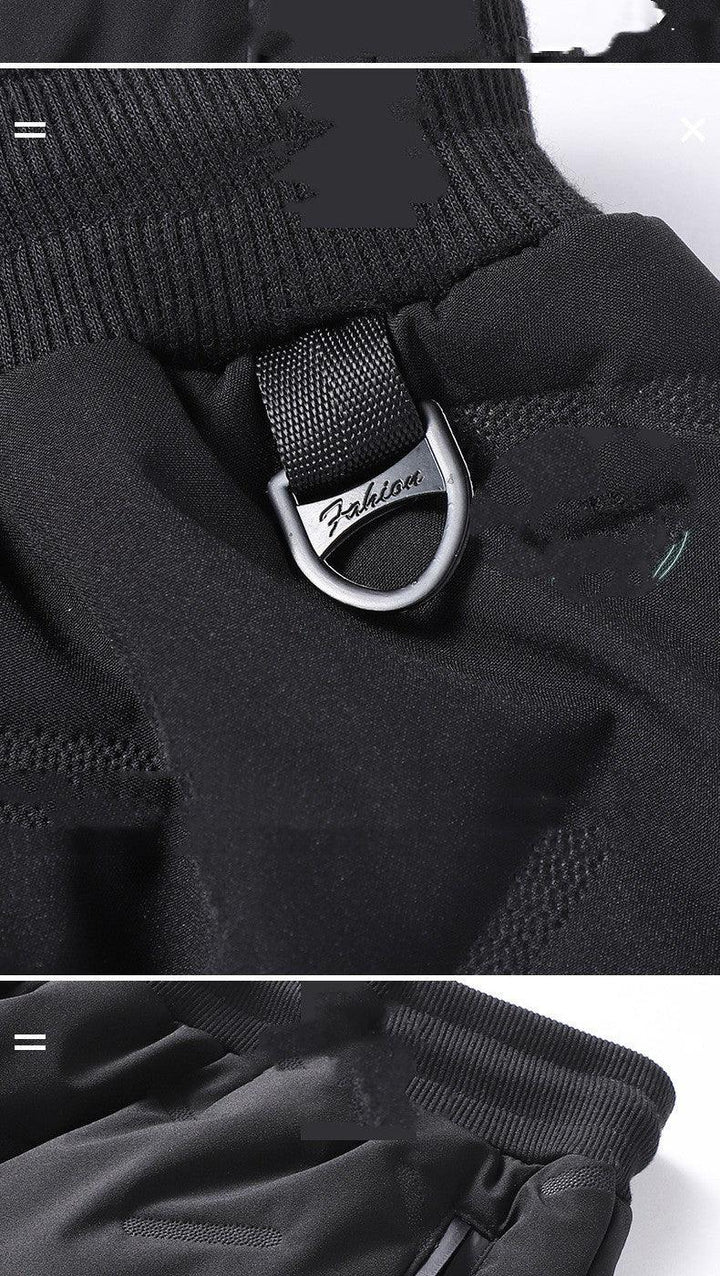 Black gloves with ribbed cuffs and metal D-ring detail labeled Fashion on durable fabric