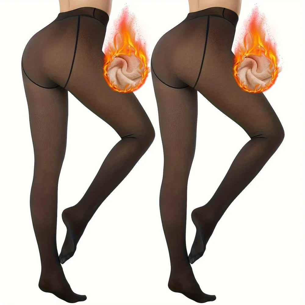 Two legs wearing black thermal fleece-lined tights with flame graphic highlighting warm inner fabric