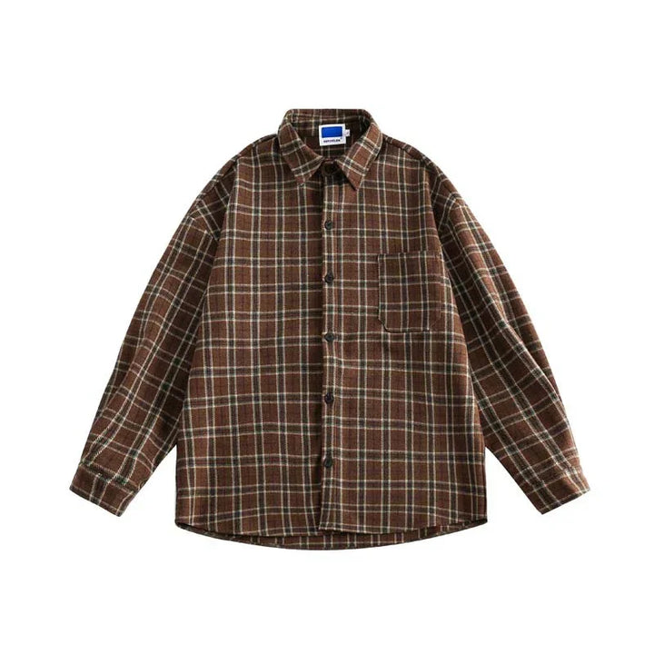 Brown plaid flannel shirt with long sleeves and chest pocket on white background