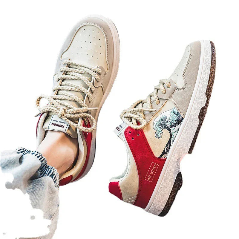 Beige and red casual sneakers with graphic detail and thick rope laces on white background