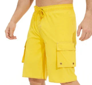 Men's yellow cargo shorts with drawstring waist and flap pockets on sides