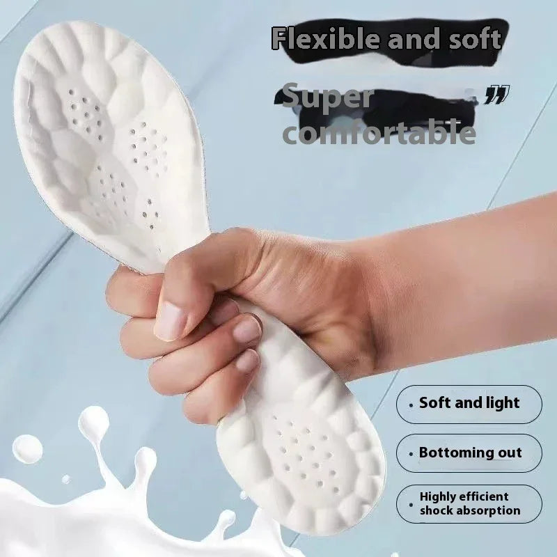 Hand squeezing flexible white shoe insole with honeycomb pattern and shock absorption features