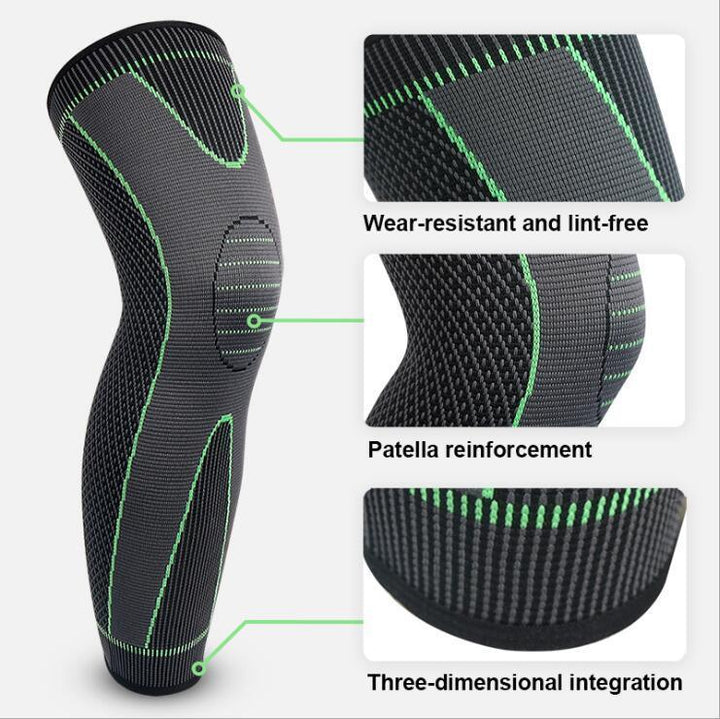 Black and green knee brace with patella reinforcement and wear-resistant fabric details.