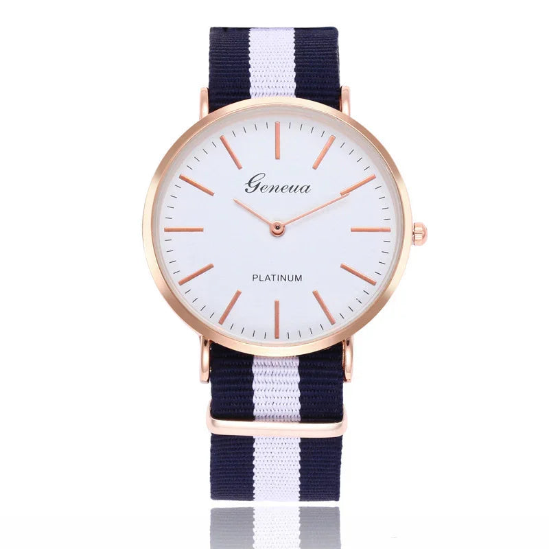 Geneva Platinum wristwatch with rose gold case and navy blue and white striped fabric band