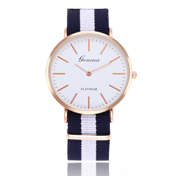 Geneva Platinum wristwatch with rose gold case and navy blue and white striped fabric band