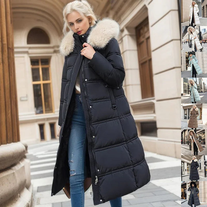 Blonde woman wearing long black puffer coat with white fur collar walking in urban setting