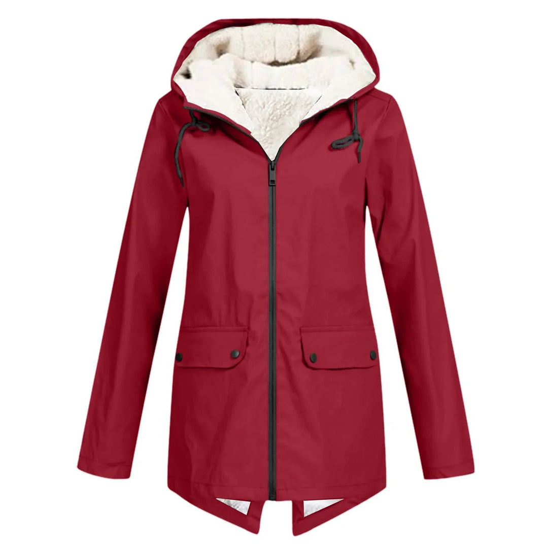 Women's red hooded winter coat with white fleece lining, front zipper, and button pockets