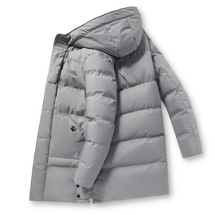 Light gray puffer jacket with hood and side pocket on white background