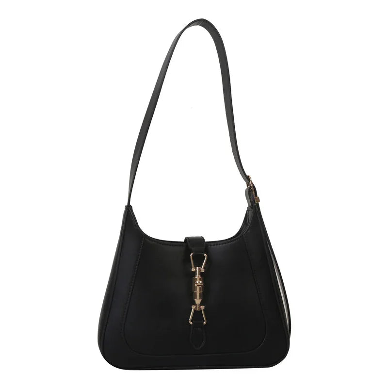 Black leather shoulder handbag with gold-tone clasp on white background