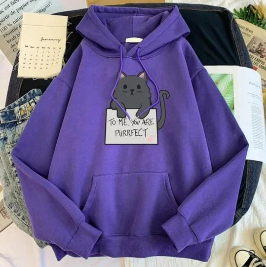Purple hoodie with a black cat graphic and 'To me, you are purrfect' text on front pocket
