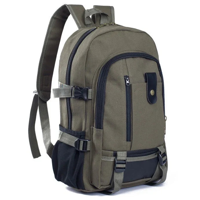 Olive green and black canvas backpack with multiple zippered compartments and adjustable shoulder straps