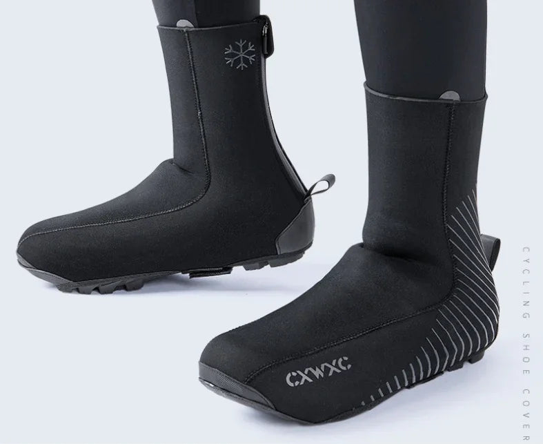 Black neoprene cycling shoe covers with zipper, reflective snowflake logo, and anti-slip sole