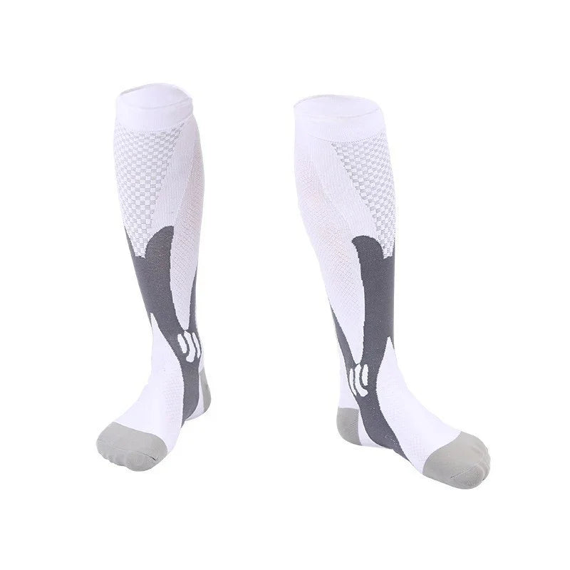 Pair of white knee-high compression socks with grey toe and black and grey anatomical design