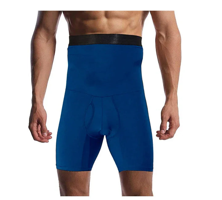 Male model wearing high-waisted blue compression shorts with black waistband on white background