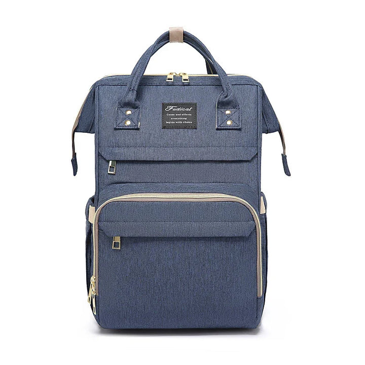 blue fabric backpack with multiple zippered compartments and top handles