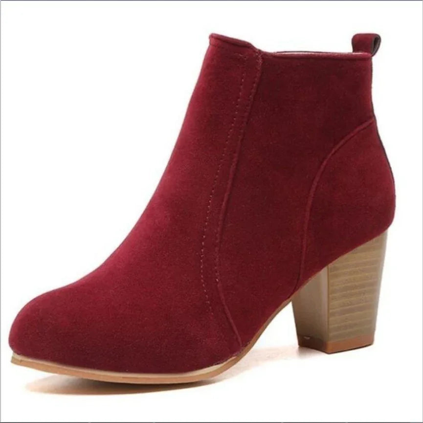 Women's burgundy suede ankle boot with stacked block heel and pull tab