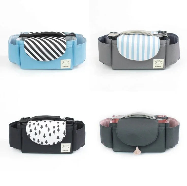 Four padded baby carriers with striped, tree, and solid patterns in blue, gray, and black colors