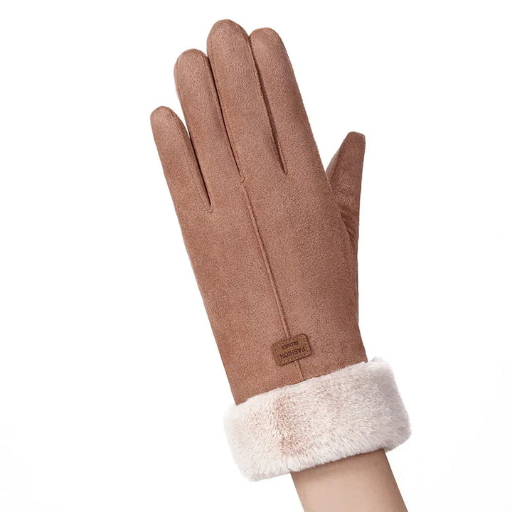 Brown suede winter glove with soft white faux fur cuff on hand