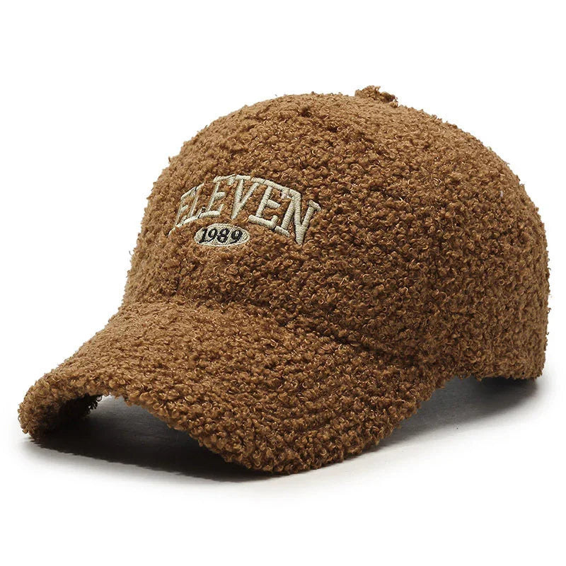 Brown textured sherpa baseball cap with embroidered ELEVEN 1989 logo on front