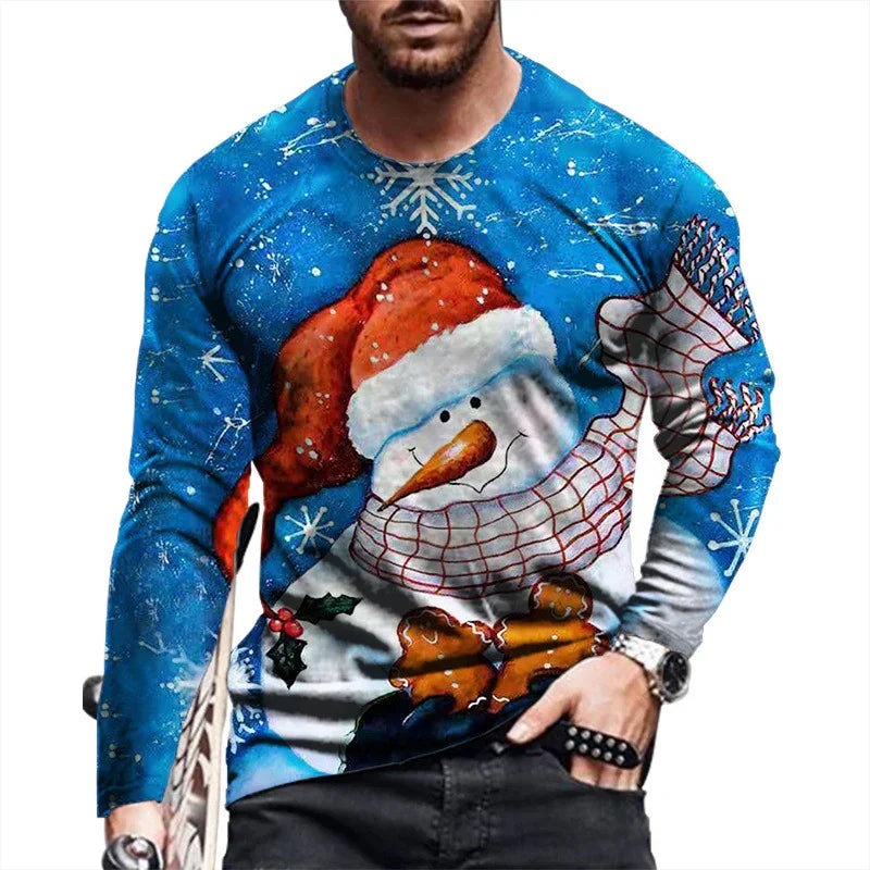 Man wearing blue Christmas sweater with smiling snowman, red Santa hat, scarf, and gingerbread cookies