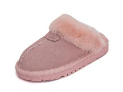 Soft pink women's slip-on slipper with fluffy fur lining and rubber sole