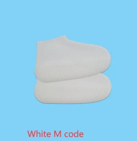 White M code shoe covers on blue background, protective disposable footwear
