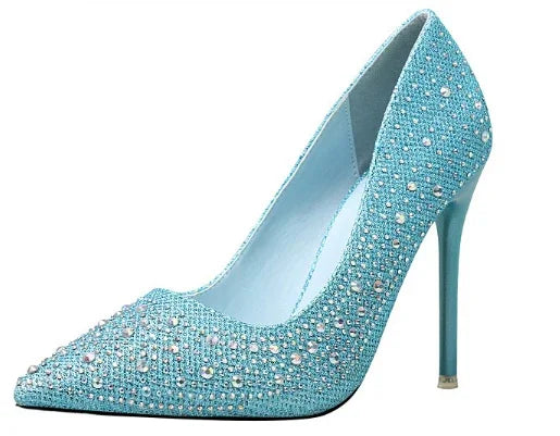 Single blue high heel shoe with pointed toe, covered in sparkling rhinestones and pearls