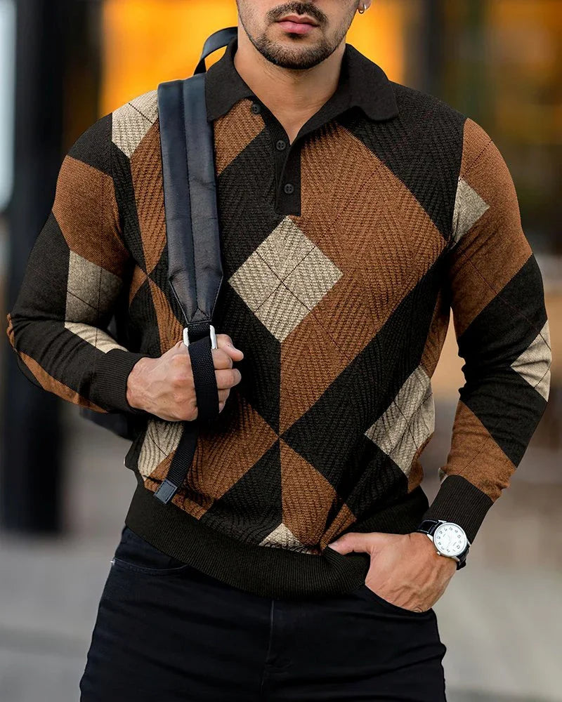 Man wearing brown, black, and beige argyle patterned sweater with collar and black buttons