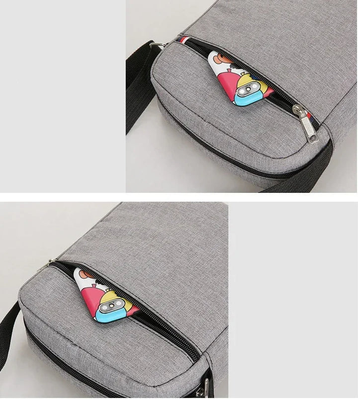 Gray crossbody bag with black zipper and strap, partially unzipped showing colorful cartoon card inside