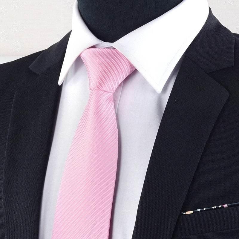 Black suit with white shirt and light pink striped necktie on mannequin