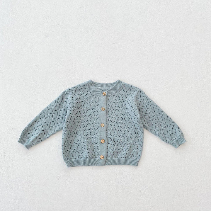 Light blue knitted baby cardigan with diamond pattern and wooden buttons on white background