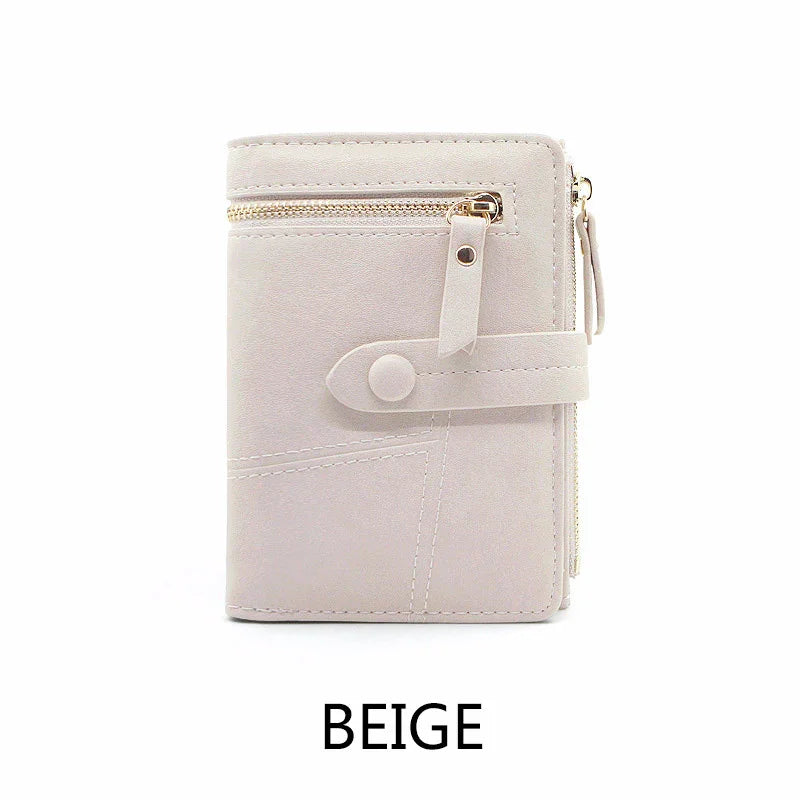 Beige compact wallet with zippered pocket and snap button strap closure