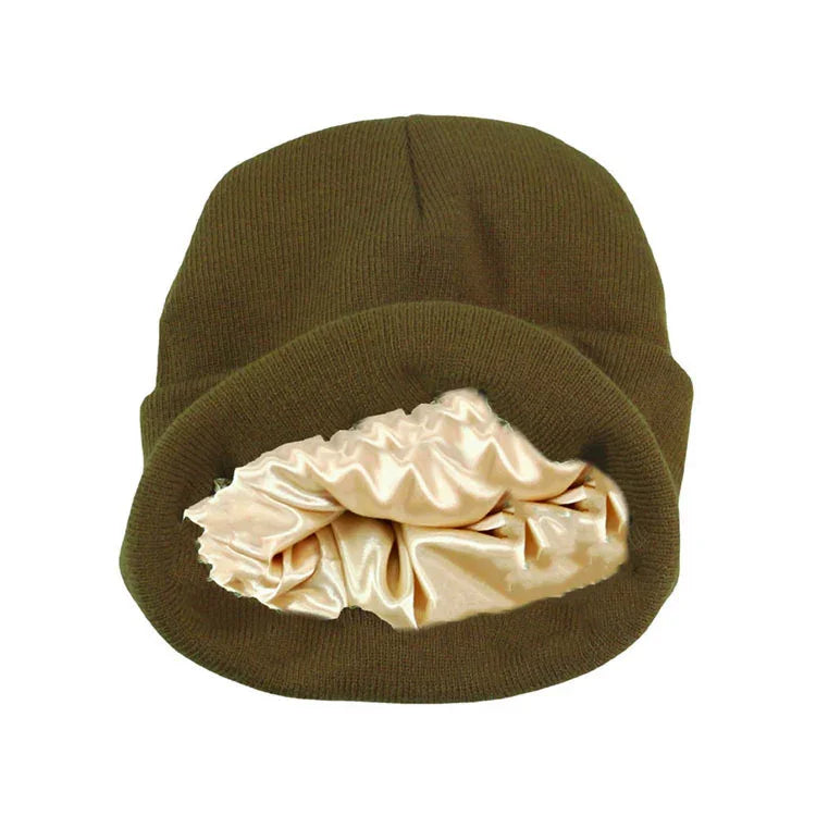 Olive green knit beanie hat with soft beige satin lining for warmth and comfort