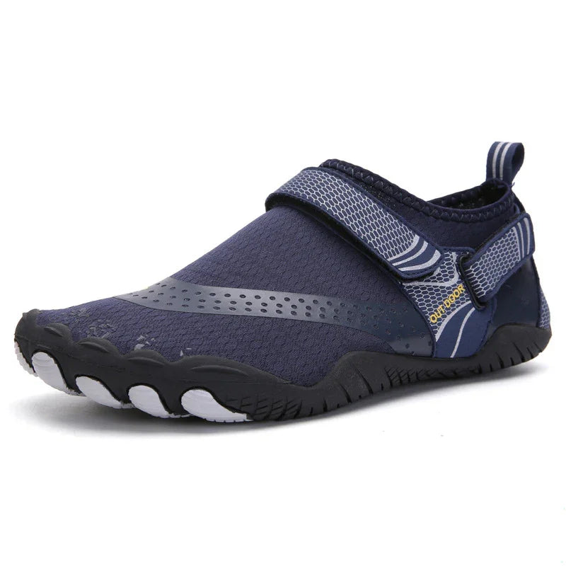 Navy blue water shoe with adjustable strap and flexible black sole for outdoor activities