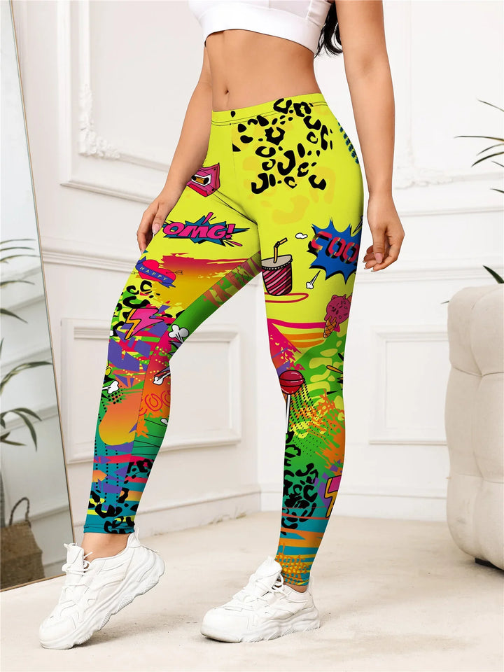 Colorful women's leggings with graffiti-style print, leopard spots, and cartoon elements, worn indoors