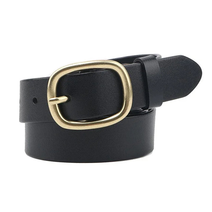 Black leather belt with a rounded rectangular antique brass buckle rolled on white background