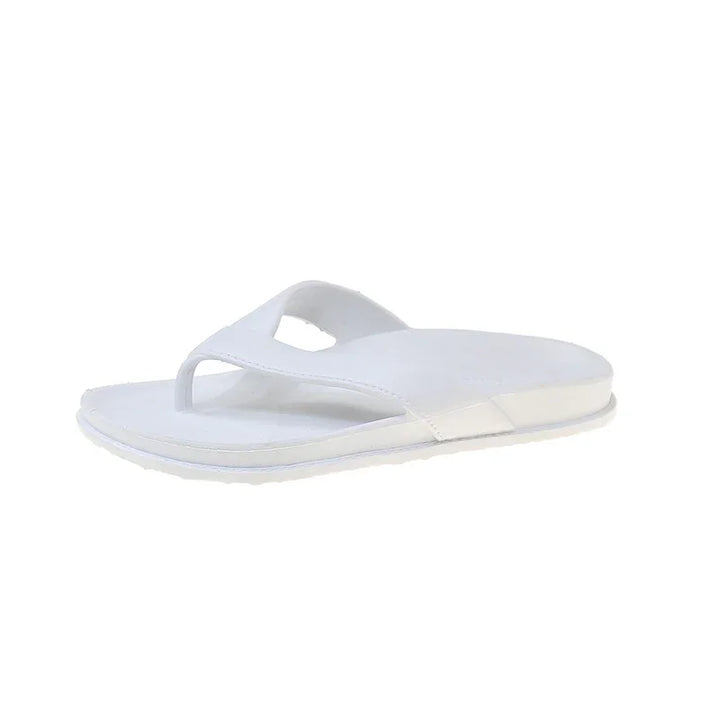 white men's leather flip flop sandal with toe post and cushioned sole