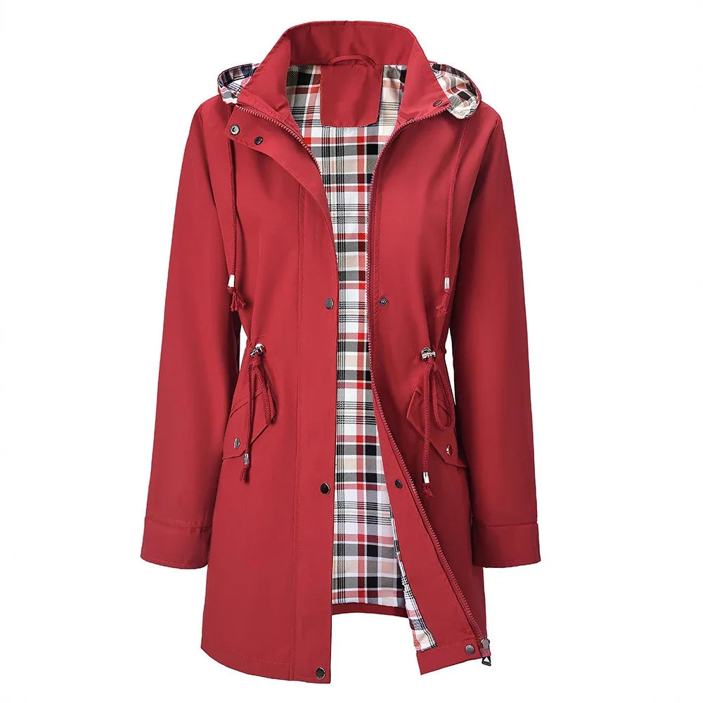 Red women's raincoat with hood and plaid inner lining, front zipper and adjustable drawstrings