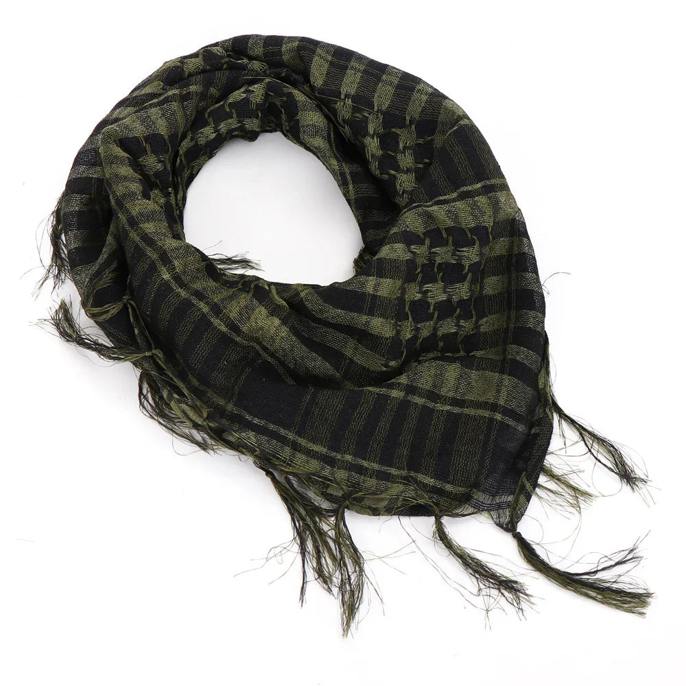 Black and olive green checkered tactical scarf with fringed edges on white background