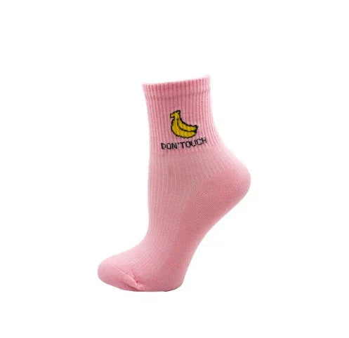 Pink ankle sock with yellow banana graphic and black text 'DON'T TOUCH' on white background