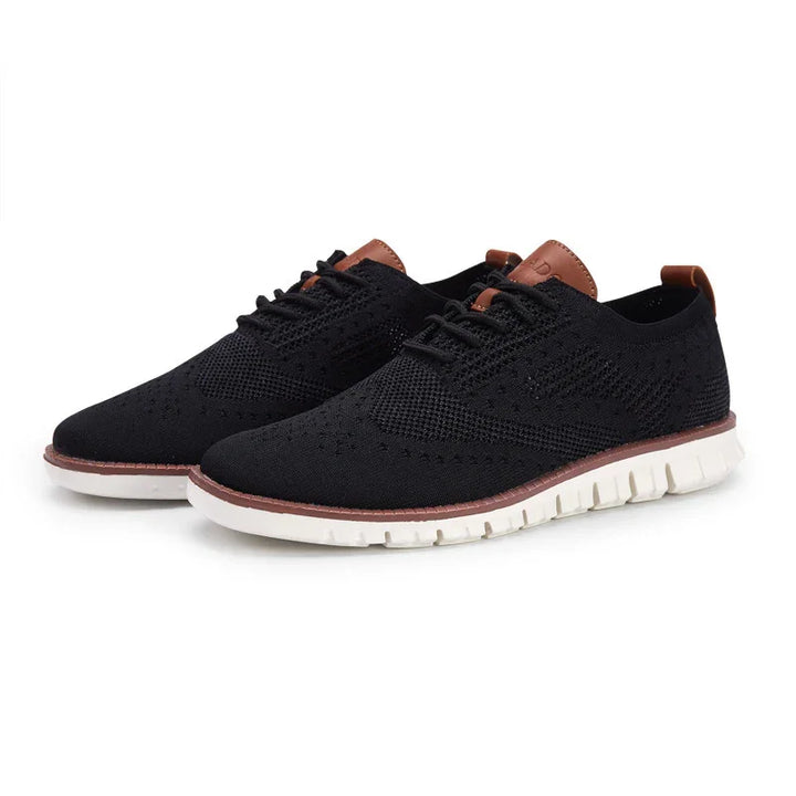 Black knit casual lace-up shoes with white sole and brown leather details, modern lightweight design