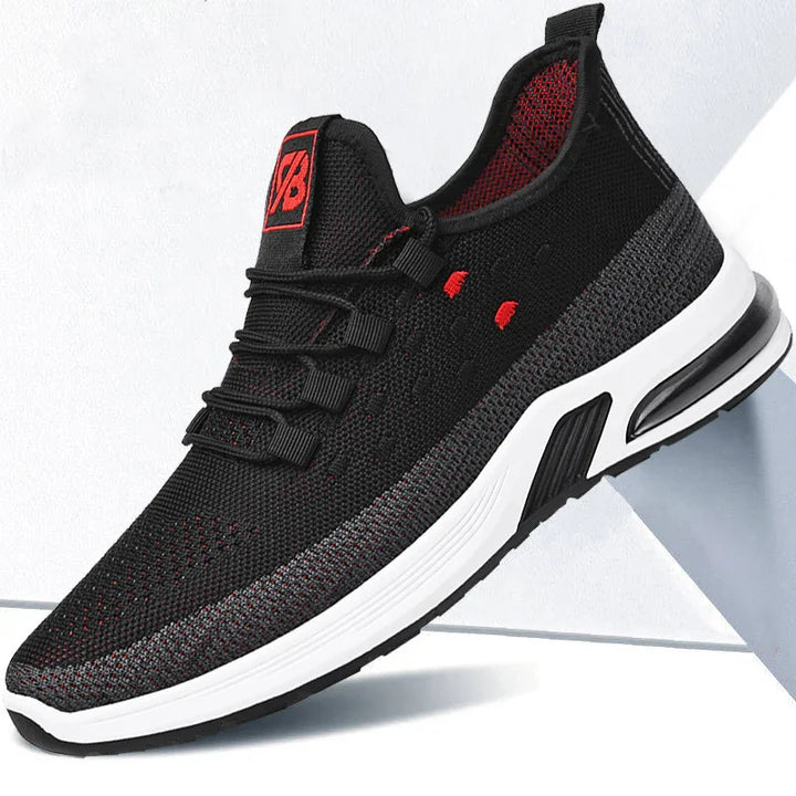 Black and red lightweight running shoe with white cushioned sole and breathable knit upper