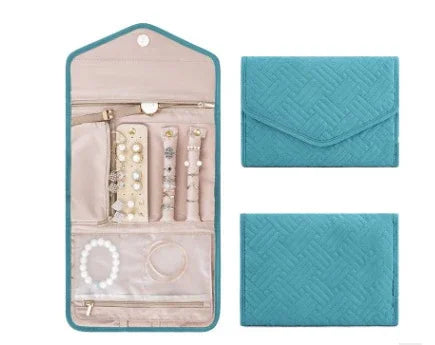 Turquoise quilted jewelry organizer pouch shown closed and open with earrings, bracelets, and rings inside