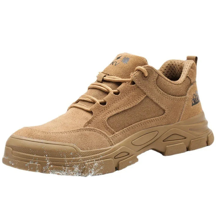 tan suede and mesh water-resistant sneaker with rubber sole splashing in water