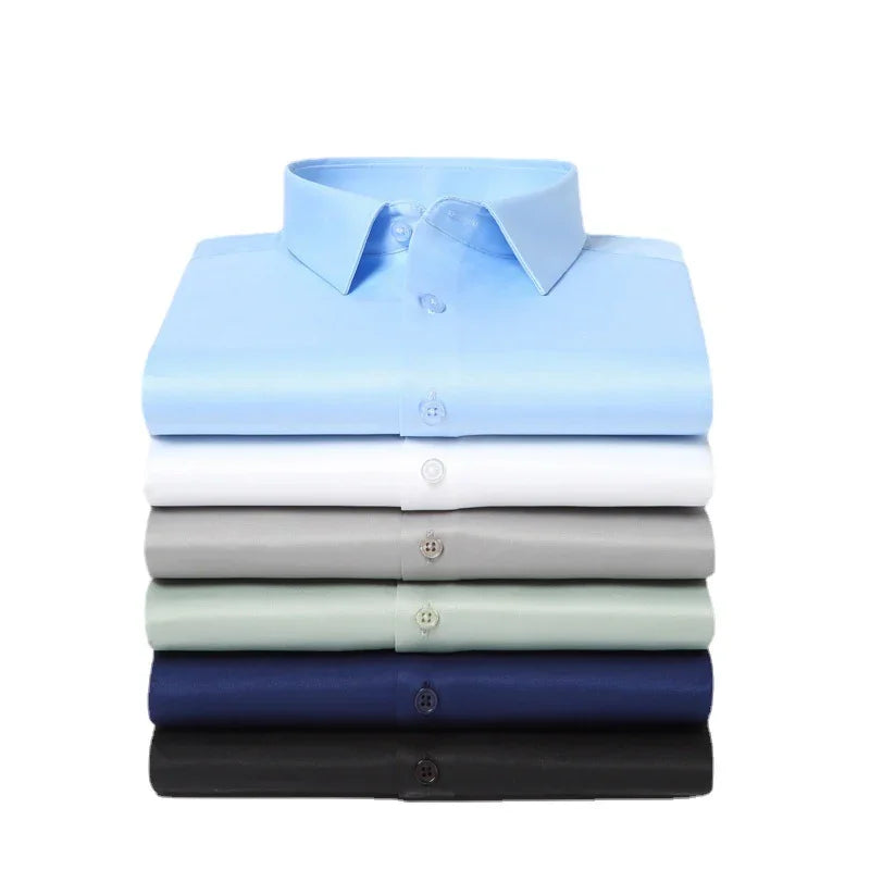 Stack of six neatly folded dress shirts in blue, white, gray, green, navy, and black colors