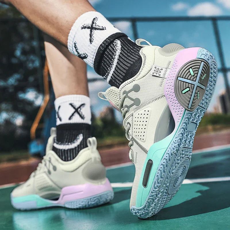 Close-up of stylish beige and pastel basketball shoes with patterned sole on outdoor court