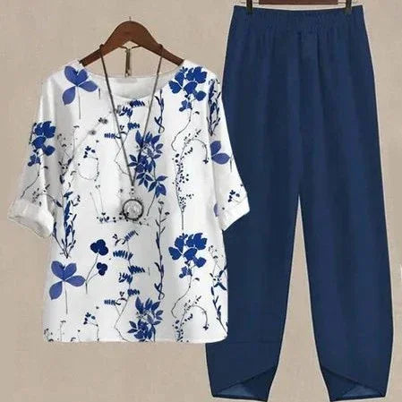White top with blue floral print and blue elastic waist pants outfit set
