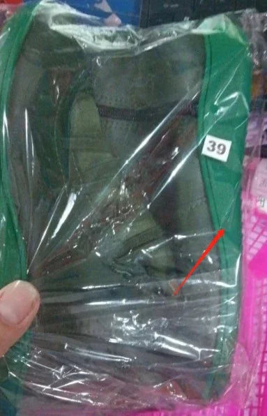 Green rectangular food container wrapped in clear plastic with a white size tag labeled 39